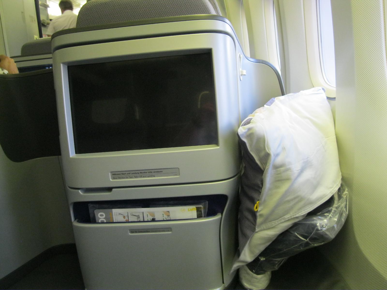 Business class seat monitor.  I had to lean forward to adjust it