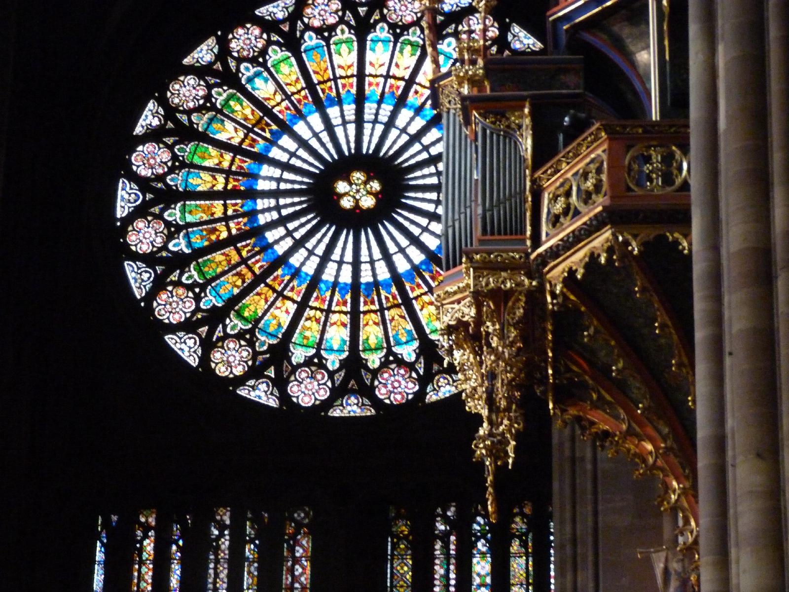 Stained glass Window over Entrance and Pipe Organ pipes