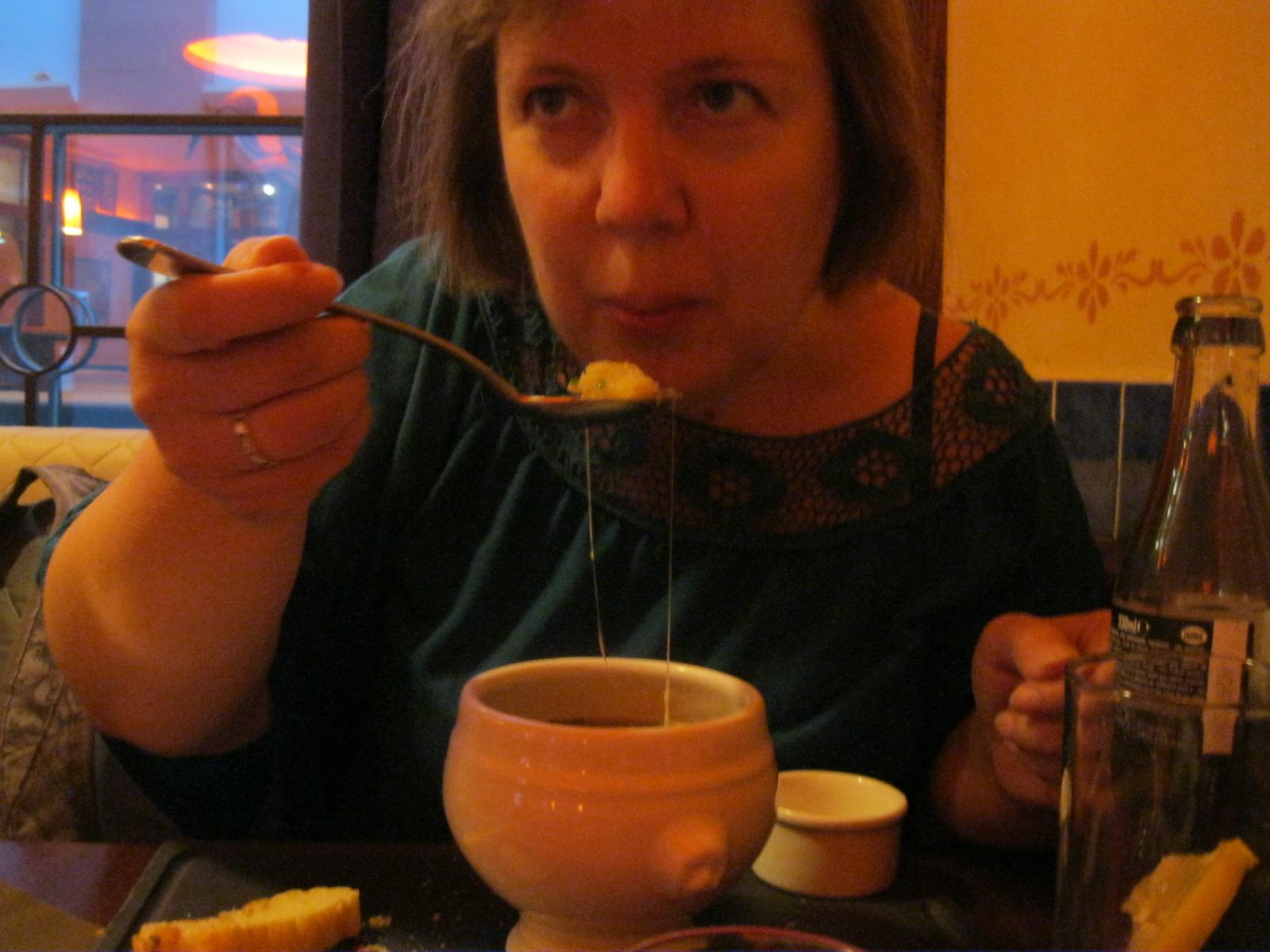 Chris tries onion soup for the first time.
